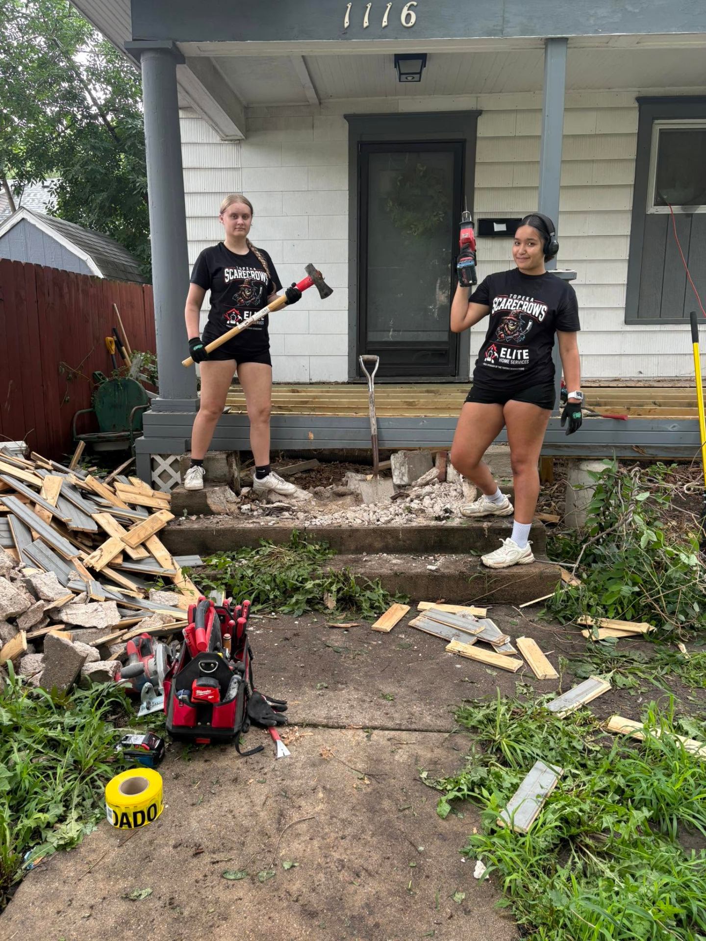 Elite Home Services crew working on a Topeka home porch repair